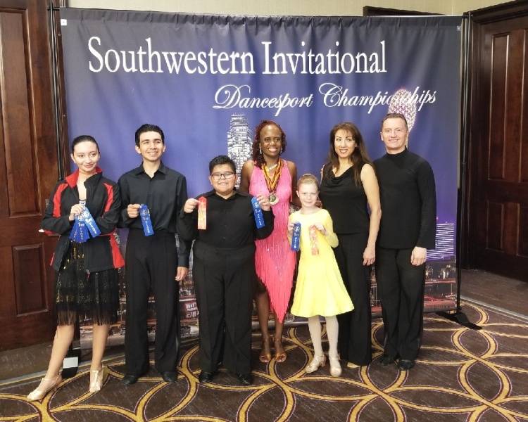 Denis and Jeanette with group of students at dance competition in Dallas